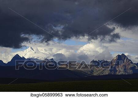 Mountain range of the Cordillera Blanca under dark clouds, Ruta 110, near Chavín de Huántar, Ancash region, Peru, South America View Large Photo Image Stock Image - Mountain range of the Cordillera Blanca under dark clouds, Ruta 110, near Chavín de Huántar, Ancash region, Peru, South America. Fotosearch
