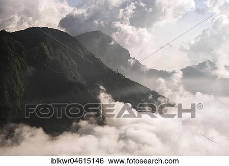 Stock Photograph - Mountain slopes above the sea of clouds, Nantou, Taiwan, China, Asia. Fotosearch