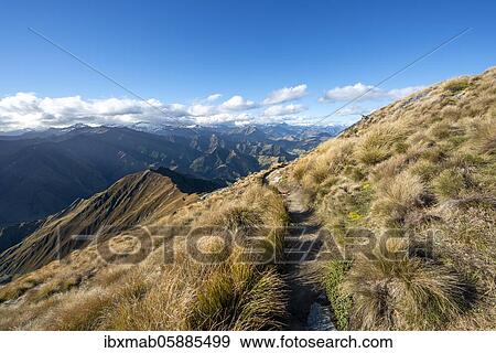 Stock Photo - Mountain views, hiking trail to Ben Lomond peak, Southern Alps, Otago, South Island, New Zealand, Oceania. Fotosearch