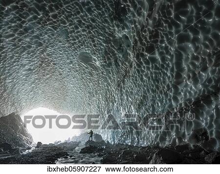 Mountaineer in the ice chapel with meltwater stream, ice field at the foot of the Watzmann east face, Berchtesgaden National Park, Watzmann, Schönau am Königssee, Upper Bavaria, Bavaria, Germany, Europe View Large Photo Image Stock Photo - Mountaineer in the ice chapel with meltwater stream, ice field at the foot of the Watzmann east face, Berchtesgaden National Park, Watzmann, Schönau am Königssee, Upper Bavaria, Bavaria, Germany, Europe. Fotosearch