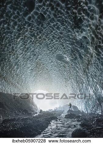 Mountaineer in the ice chapel with meltwater stream, ice field at the foot of the Watzmann east face, Berchtesgaden National Park, Watzmann, Schönau am Königssee, Upper Bavaria, Bavaria, Germany, Europe View Large Photo Image Stock Photo - Mountaineer in the ice chapel with meltwater stream, ice field at the foot of the Watzmann east face, Berchtesgaden National Park, Watzmann, Schönau am Königssee, Upper Bavaria, Bavaria, Germany, Europe. Fotosearch