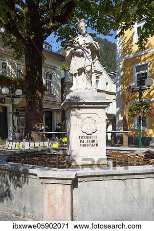 Stock Image - Nepomuk Fountain at Kreuzplatz, Bad Ischl, Salzkammergut, Upper Austria, Austria, Europe. Fotosearch