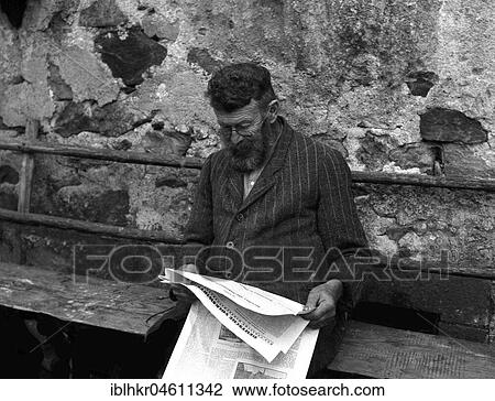 Newspaper reader, ca. 1955, Freiburg, Germany, Europe View Large Photo Image Stock Image - Newspaper reader, ca. 1955, Freiburg, Germany, Europe. Fotosearch