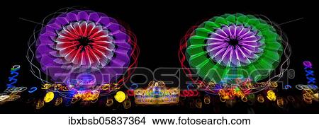 Picture - Night shot, dynamic lights, rides, Giegelberg amusement park, Biberach, Baden-Württemberg, Germany, Europe. Fotosearch