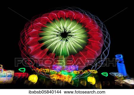 Night shot, dynamic lights, rides, Giegelberg amusement park, Biberach, Baden-Württemberg, Germany, Europe View Large Photo Image Picture - Night shot, dynamic lights, rides, Giegelberg amusement park, Biberach, Baden-Württemberg, Germany, Europe. Fotosearch