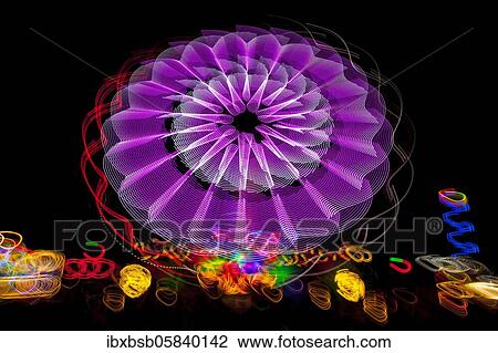 Night shot, dynamic lights, rides, Giegelberg amusement park, Biberach, Baden-Württemberg, Germany, Europe View Large Photo Image Stock Image - Night shot, dynamic lights, rides, Giegelberg amusement park, Biberach, Baden-Württemberg, Germany, Europe. Fotosearch