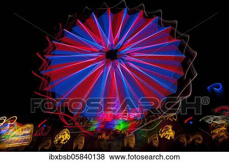 Night shot, dynamic lights, rides, Giegelberg amusement park, Biberach, Baden-Württemberg, Germany, Europe View Large Photo Image Stock Photo - Night shot, dynamic lights, rides, Giegelberg amusement park, Biberach, Baden-Württemberg, Germany, Europe. Fotosearch