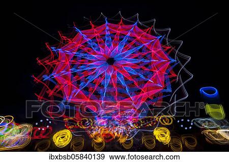 Night shot, dynamic lights, rides, Giegelberg amusement park, Biberach, Baden-Württemberg, Germany, Europe View Large Photo Image Stock Photo - Night shot, dynamic lights, rides, Giegelberg amusement park, Biberach, Baden-Württemberg, Germany, Europe. Fotosearch