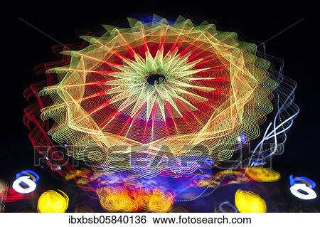 Night shot, dynamic lights, rides, Giegelberg amusement park, Biberach, Baden-Württemberg, Germany, Europe View Large Photo Image Stock Photograph - Night shot, dynamic lights, rides, Giegelberg amusement park, Biberach, Baden-Württemberg, Germany, Europe. Fotosearch