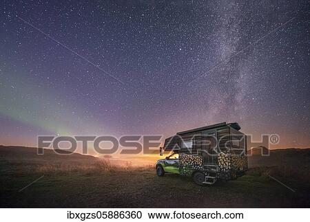 Night shot of a painted camper van under the Milky Way with northern lights, Gimsøy, Lofoten, Nordland, Norway, Europe View Large Photo Image Stock Image - Night shot of a painted camper van under the Milky Way with northern lights, Gimsøy, Lofoten, Nordland, Norway, Europe. Fotosearch