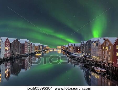 Northern Lights Bakklandet historical warehouses Trondheim Norway View Large Photo Image Picture - Northern Lights Bakklandet historical warehouses Trondheim Norway. Fotosearch