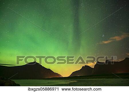 Northern lights in front of a starry sky on the beach, Haukland, Leknes, Nordland, Lofoten, Norway, Europe View Large Photo Image Stock Image - Northern lights in front of a starry sky on the beach, Haukland, Leknes, Nordland, Lofoten, Norway, Europe. Fotosearch