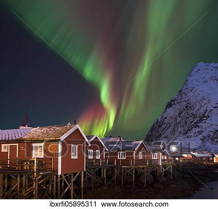 Stock Image - Northern Lights in Pure Historic Fishing Lofoten Norway. Fotosearch