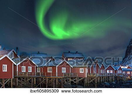 Stock Photo - Northern Lights in Pure Historic Fishing Lofoten Norway. Fotosearch
