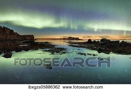 Northern lights over the sea, island with small lighthouse, Gimsøy, Lofoten, Nordland, Norway, Europe View Large Photo Image Stock Image - Northern lights over the sea, island with small lighthouse, Gimsøy, Lofoten, Nordland, Norway, Europe. Fotosearch