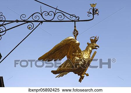 Nose shield, Eagle figure with sword, crown and orb, heraldic animal of Prussia, Royal Prussian Eagle, golden, Langenzenn, Middle Franconia, Franconia, Bavaria, Germany, Europe View Large Photo Image Stock Photography - Nose shield, Eagle figure with sword, crown and orb, heraldic animal of Prussia, Royal Prussian Eagle, golden, Langenzenn, Middle Franconia, Franconia, Bavaria, Germany, Europe. Fotosearch