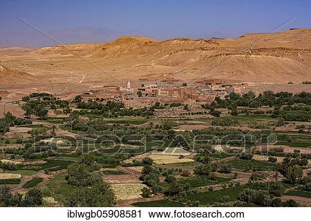 Stock Image - Oasis Tinerhir with old mud houses and newly constructed buildings, Tinerhir, Souss-Massa-Draa, High Atlas, Morocco, Africa. Fotosearch