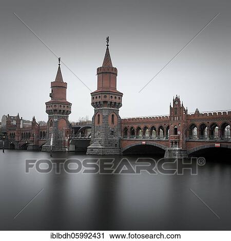 Oberbaum bridge across the Spree, connecting the Berlin districts of Kreuzberg and Friedrichshain, Berlin, Germany, Europe View Large Photo Image Stock Image - Oberbaum bridge across the Spree, connecting the Berlin districts of Kreuzberg and Friedrichshain, Berlin, Germany, Europe. Fotosearch
