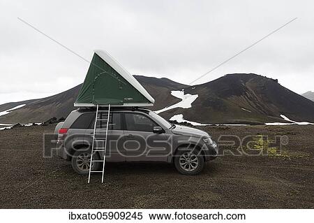 Off-road vehicle with roof tent and ladder, barren volcanic landscape with snowfields, Snæfellsjökull, Snæfellsnes peninsula, Iceland, Europe View Large Photo Image Stock Photography - Off-road vehicle with roof tent and ladder, barren volcanic landscape with snowfields, Snæfellsjökull, Snæfellsnes peninsula, Iceland, Europe. Fotosearch