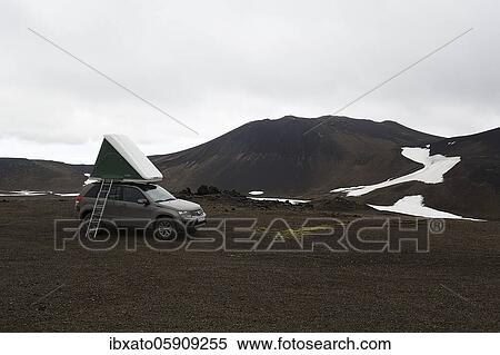 Off-road vehicle with roof tent and ladder on barren plateau, volcanic landscape with snowfields, Snæfellsjökull, Snæfellsnes peninsula, Iceland, Europe View Large Photo Image Stock Photography - Off-road vehicle with roof tent and ladder on barren plateau, volcanic landscape with snowfields, Snæfellsjökull, Snæfellsnes peninsula, Iceland, Europe. Fotosearch