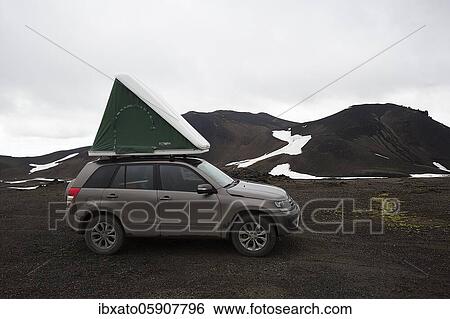 Off-road vehicle with roof tent in the mountains, barren volcanic landscape with snowfields, Snæfellsjökull, Snäfellsjökull, Snæfellsnes peninsula, Snäfellsnes, Iceland, Europe View Large Photo Image Stock Photograph - Off-road vehicle with roof tent in the mountains, barren volcanic landscape with snowfields, Snæfellsjökull, Snäfellsjökull, Snæfellsnes peninsula, Snäfellsnes, Iceland, Europe. Fotosearch