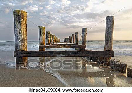 Old decayed jetty, Darß, Fischland-Darß-Zingst, Baltic Sea coast, Mecklenburg-Western Pomerania, Germany, Europe View Large Photo Image Picture - Old decayed jetty, Darß, Fischland-Darß-Zingst, Baltic Sea coast, Mecklenburg-Western Pomerania, Germany, Europe. Fotosearch