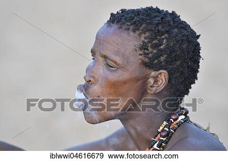 Old San woman smoking, portrait, Bushman tribe, Kalahari, Namibia, Africa View Large Photo Image Stock Photo - Old San woman smoking, portrait, Bushman tribe, Kalahari, Namibia, Africa. Fotosearch