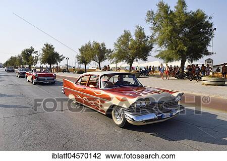 Stock Image - Oldtimer Corso, American Classic Car Cruise, Summer Jamboree, Rock' n' Roll Festival, beach promenade, Lungomare Leonardo da Vinci, Senigallia, province of Ancona, Marches, Italy, Europe. Fotosearch