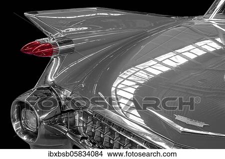 Oldtimer detail, Cadillac Sedan Deville 1959, in black and white, with red brake light View Large Photo Image Picture - Oldtimer detail, Cadillac Sedan Deville 1959, in black and white, with red brake light. Fotosearch
