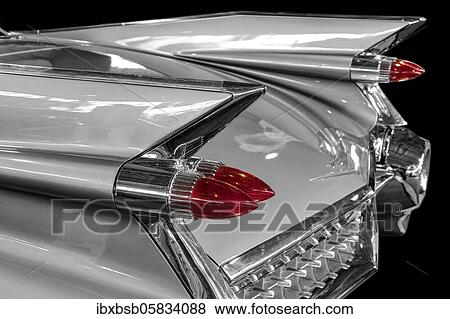 Oldtimer detail, Cadillac Sedan Deville 1959, in black and white, with red brake light View Large Photo Image Stock Photo - Oldtimer detail, Cadillac Sedan Deville 1959, in black and white, with red brake light. Fotosearch