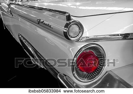 Oldtimer detail, Ford Galaxy 1959, in black and white, with red brake light View Large Photo Image Picture - Oldtimer detail, Ford Galaxy 1959, in black and white, with red brake light. Fotosearch