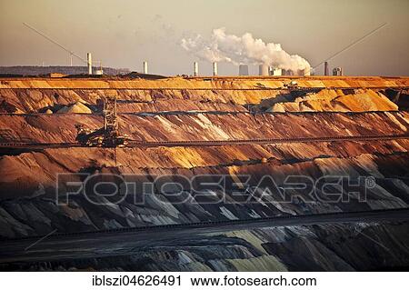 Open cast lignite mine with power station, Garzweiler, Jüchen, Rheinische Braunkohlerevier, North Rhine-Westphalia, Germany, Europe View Large Photo Image Stock Image - Open cast lignite mine with power station, Garzweiler, Jüchen, Rheinische Braunkohlerevier, North Rhine-Westphalia, Germany, Europe. Fotosearch