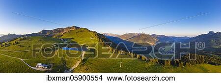 Picture - Panorama at Sudelfeld, Walleralm reservoir, Großer and Kleiner Traithen, near Bayrischzell in Leitzachtal, on the right Wendelstein, Mangfall mountains, drone shot, Upper Bavaria, Bavaria, Germany, Europe. Fotosearch