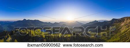Stock Image - Panorama from Sudelfeld at sunrise, near Bayrischzell, Mangfall mountains, Upper Bavaria, Bavaria, Germany, Europe. Fotosearch