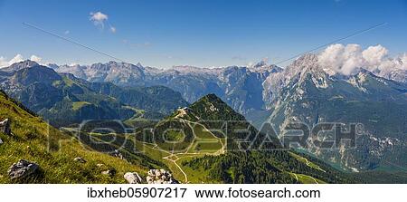Panoramic view, Alpine panorama with view of the Berchtesgadener Alps, middle of the Jenner, behind the Steinerne Meer and on the right the Watzmann, Schönau am Königssee, Berchtesgaden National Park, Berchtesgadener Land, Upper Bavaria, Bavaria,... View Large Photo Image Stock Photo - Panoramic view, Alpine panorama with view of the Berchtesgadener Alps, middle of the Jenner, behind the Steinerne Meer and on the right the Watzmann, Schönau am Königssee, Berchtesgaden National Park, Berchtesgadener Land, Upper Bavaria, Bavaria,.... Fotosearch