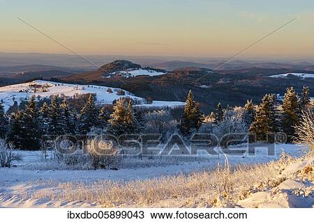 Panoramic view from Wasserkuppe in southwest direction in winter, nature park Park Hessian Rhön, Hesse, Germany, Europe View Large Photo Image Stock Image - Panoramic view from Wasserkuppe in southwest direction in winter, nature park Park Hessian Rhön, Hesse, Germany, Europe. Fotosearch