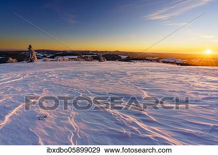 Stock Photo - Panoramic view from Wasserkuppe in south direction in winter, sunset, nature park Park Hessian Rhön, Hesse, Germany, Europe. Fotosearch
