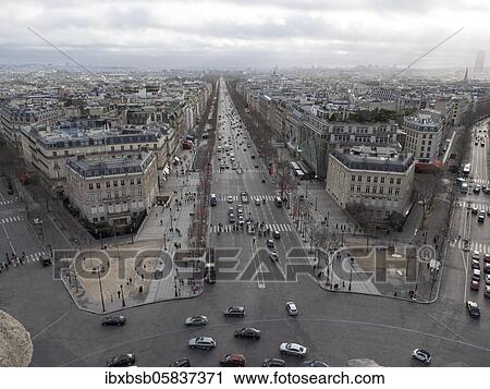 Stock Image - Panoramic view of the Avenue des Champs-Élysées from the Arc de Triomphe de l'Étoile, Paris, France, Europe. Fotosearch