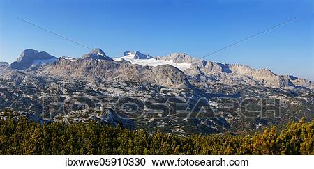 Panoramic view to the mountain station Gjaid and to the Hohen Dachstein, Dachstein massif, Krippenstein cable car, Obertraun, Salzkammergut, Upper Austria, Austria, Europe View Large Photo Image Stock Image - Panoramic view to the mountain station Gjaid and to the Hohen Dachstein, Dachstein massif, Krippenstein cable car, Obertraun, Salzkammergut, Upper Austria, Austria, Europe. Fotosearch