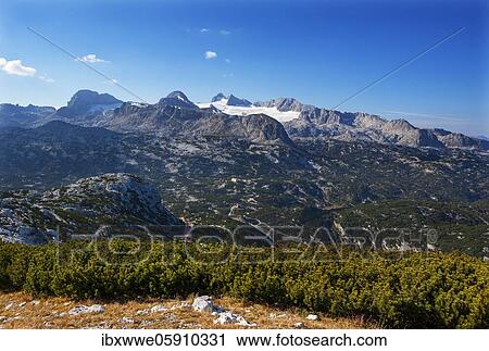Stock Image - Panoramic view to the mountain station Gjaid Alm and to the Hohen Dachstein, Dachstein massif, Krippenstein cable car, Obertraun, Salzkammergut, Upper Austria, Austria, Europe. Fotosearch