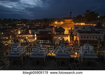 Stock Photo - Pashupatinath, also a cremation site, Ghats, on the Bagmati River, Unesco World Heritage Site, Kathmandu, the holiest place of the Nepalese Hindus in Nepal. Fotosearch