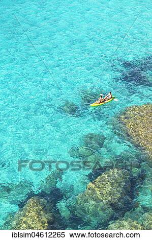 People canoeing at Cala Mitjana, Menorca, Balearic Islands, Spain, Europe View Large Photo Image Stock Photography - People canoeing at Cala Mitjana, Menorca, Balearic Islands, Spain, Europe. Fotosearch
