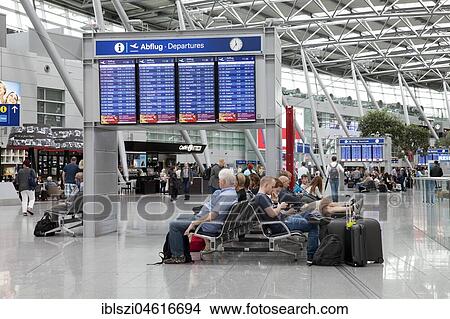 People in the terminal building, Düsseldorf International Airport, Düsseldorf, North Rhine-Westphalia, Germany, Europe View Large Photo Image Picture - People in the terminal building, Düsseldorf International Airport, Düsseldorf, North Rhine-Westphalia, Germany, Europe. Fotosearch