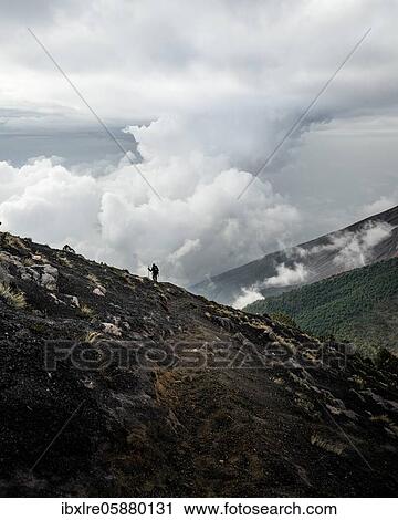 Person migrates to a volcano, Volcan de Acatenango, Guatemala, Central America View Large Photo Image Stock Image - Person migrates to a volcano, Volcan de Acatenango, Guatemala, Central America. Fotosearch