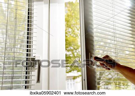 Person opens window in office and wants to air, Germany, Europe View Large Photo Image Stock Image - Person opens window in office and wants to air, Germany, Europe. Fotosearch