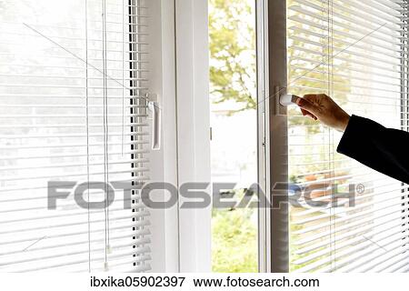 Person opens window in office and wants to air, Germany, Europe View Large Photo Image Stock Photo - Person opens window in office and wants to air, Germany, Europe. Fotosearch
