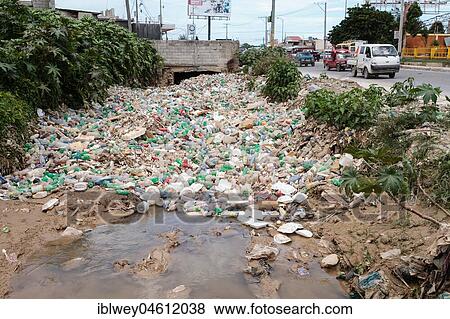 Stock Photo - Plastic waste, plastic bottle, street garbage, Port-au-Prince, Ouest, Haiti, Central America. Fotosearch