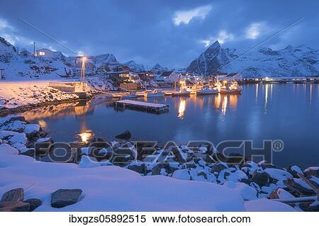 Stock Photography - Port of the fishing village Hamnoy Polar Night in winter, Reinefjord, Moskenesøya, Reine, Nordland, Lofoten, Norway, Europe. Fotosearch