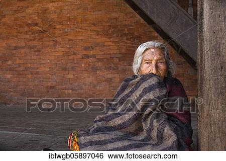 Stock Photograph - Portrait of an old Hindu woman, wrapped in a blanket, Bhaktapur, Kathmandu Valley, Nepal, Asia. Fotosearch