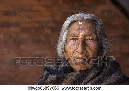 Portrait of an old Hindu woman wrapped in a blanket, Bhaktapur, Kathmandu Valley, Nepal, Asia View Large Photo Image Stock Photograph - Portrait of an old Hindu woman wrapped in a blanket, Bhaktapur, Kathmandu Valley, Nepal, Asia. Fotosearch